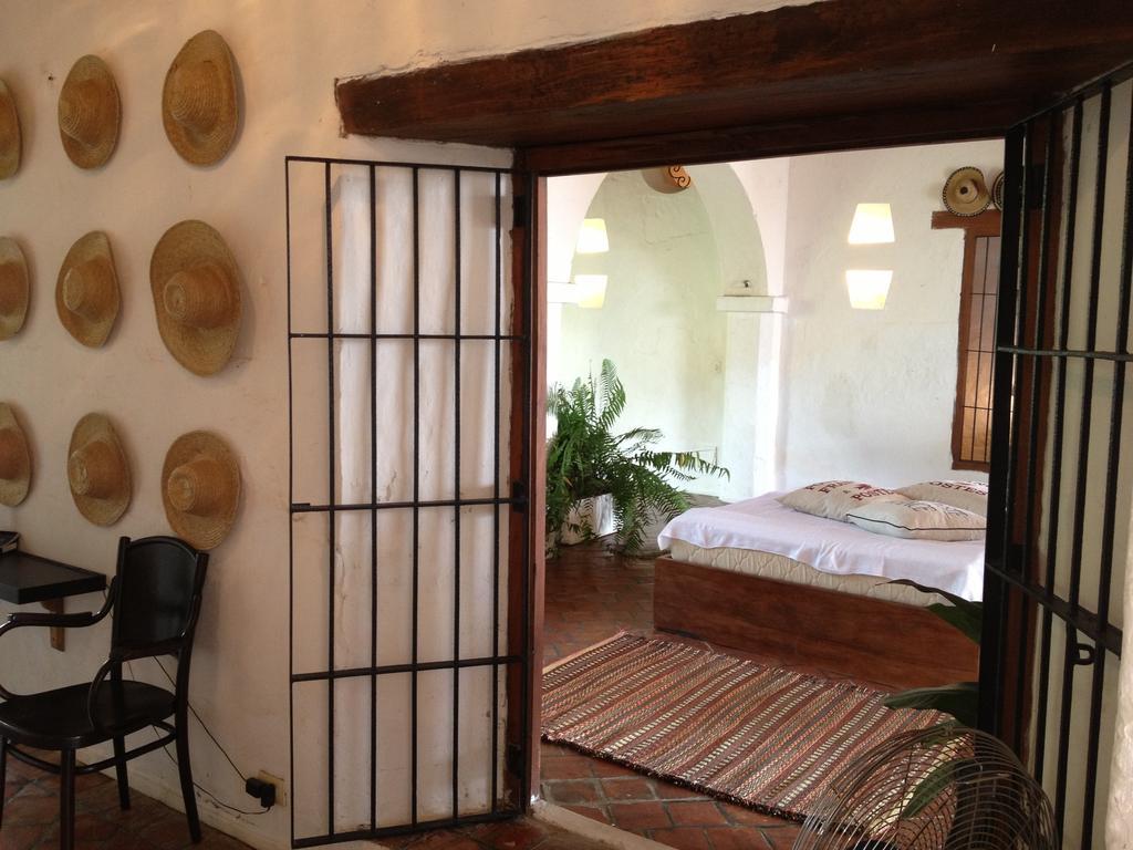 Hotel Portal De La Marquesa Mompós Esterno foto A room at the hotel